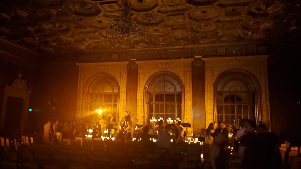 biltmore room after candlelight concert is over, clearing out