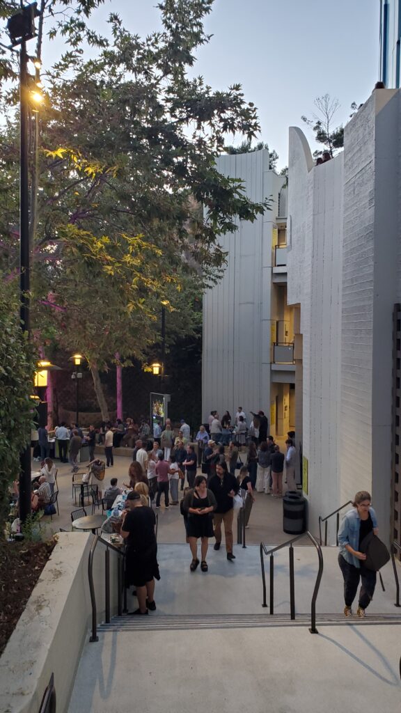 stone walls and stairs with trees around, the outer impressive area of the ford los angeles theater